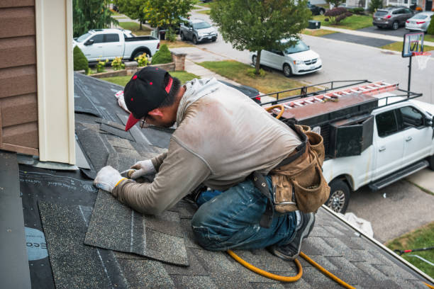 Professional Roofing technician working in West Bridgewater, MA